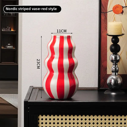Modern niche minimalist striped vases, flower arrangements in them, high-end sense, creative retro painted ceramic vases