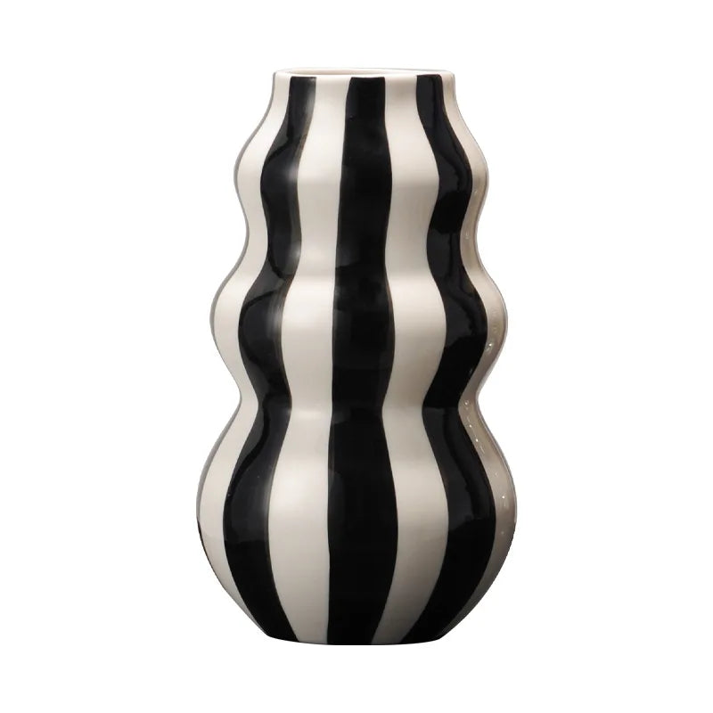 Modern niche minimalist striped vases, flower arrangements in them, high-end sense, creative retro painted ceramic vases